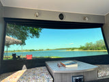  parked in a scenic mountain lot under cloudy skies.|Experience nature with this RV rental! Inside this Luna camper