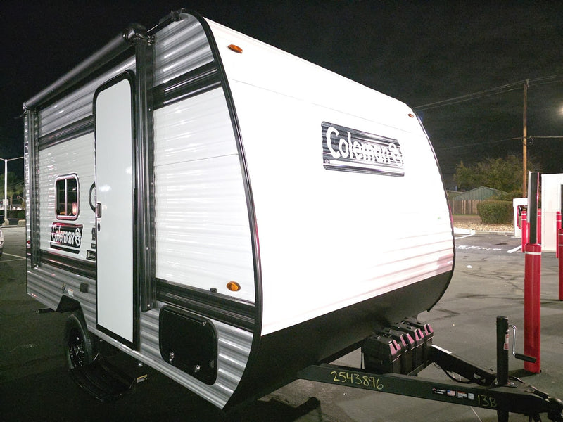 This white and gray Coleman RV rental — photo 1