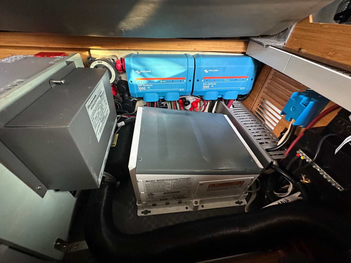 RV rental electrical power system featuring Victron DC distributors, Magnum inverter/charger, and cooling unit. — photo 2