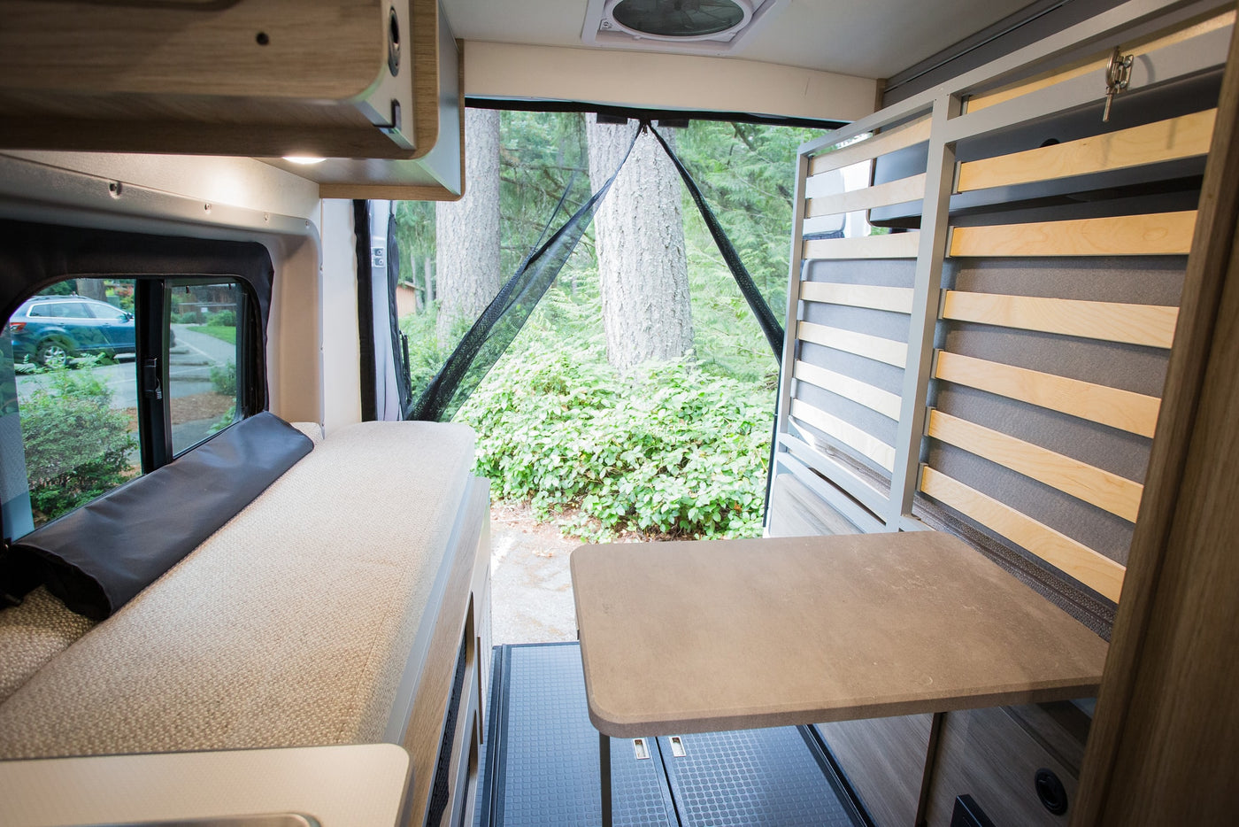  and water utility panel for your travels.|RV rental interior features kitchen — photo 10