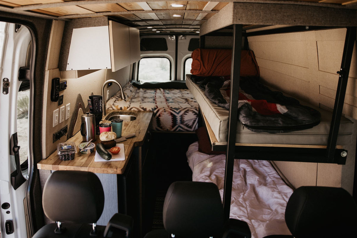  with another bed and kitchen area visible — photo 10