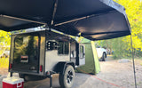 The awning sets up super easy and has lights that can be run from a power bank that can be re-charged from the battery. 