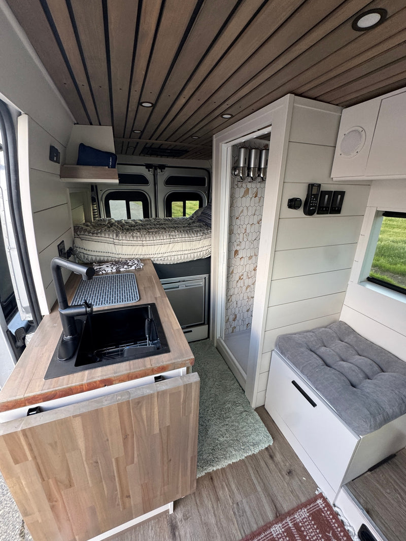  ideal for travel.|Inside this RV rental: a camper van conversion from the rear — photo 6
