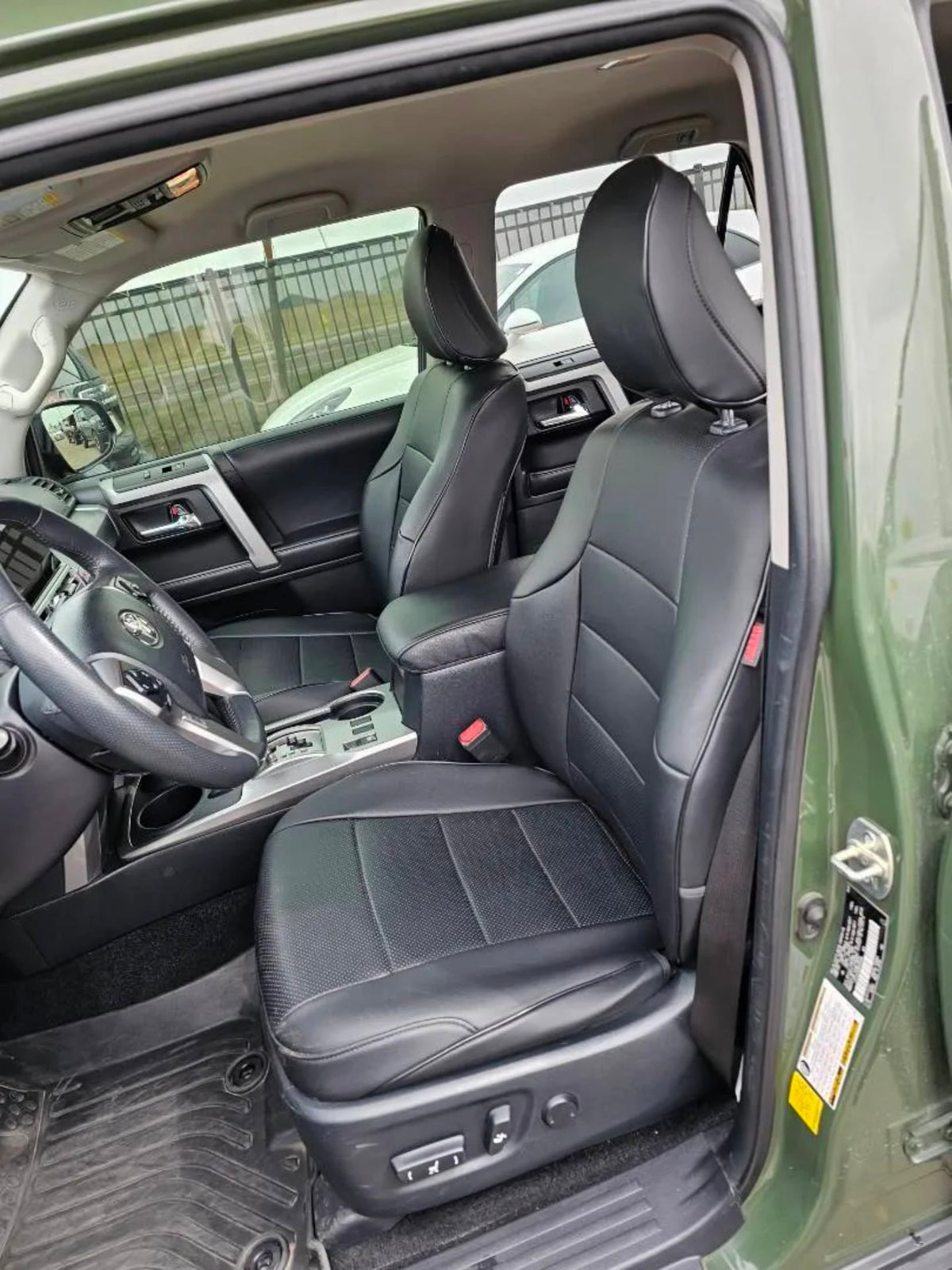  ideal for an RV rental adventure. Features a durable rubber mat and sliding tray for organized travel storage.|This green Toyota 4Runner SUV — photo 5