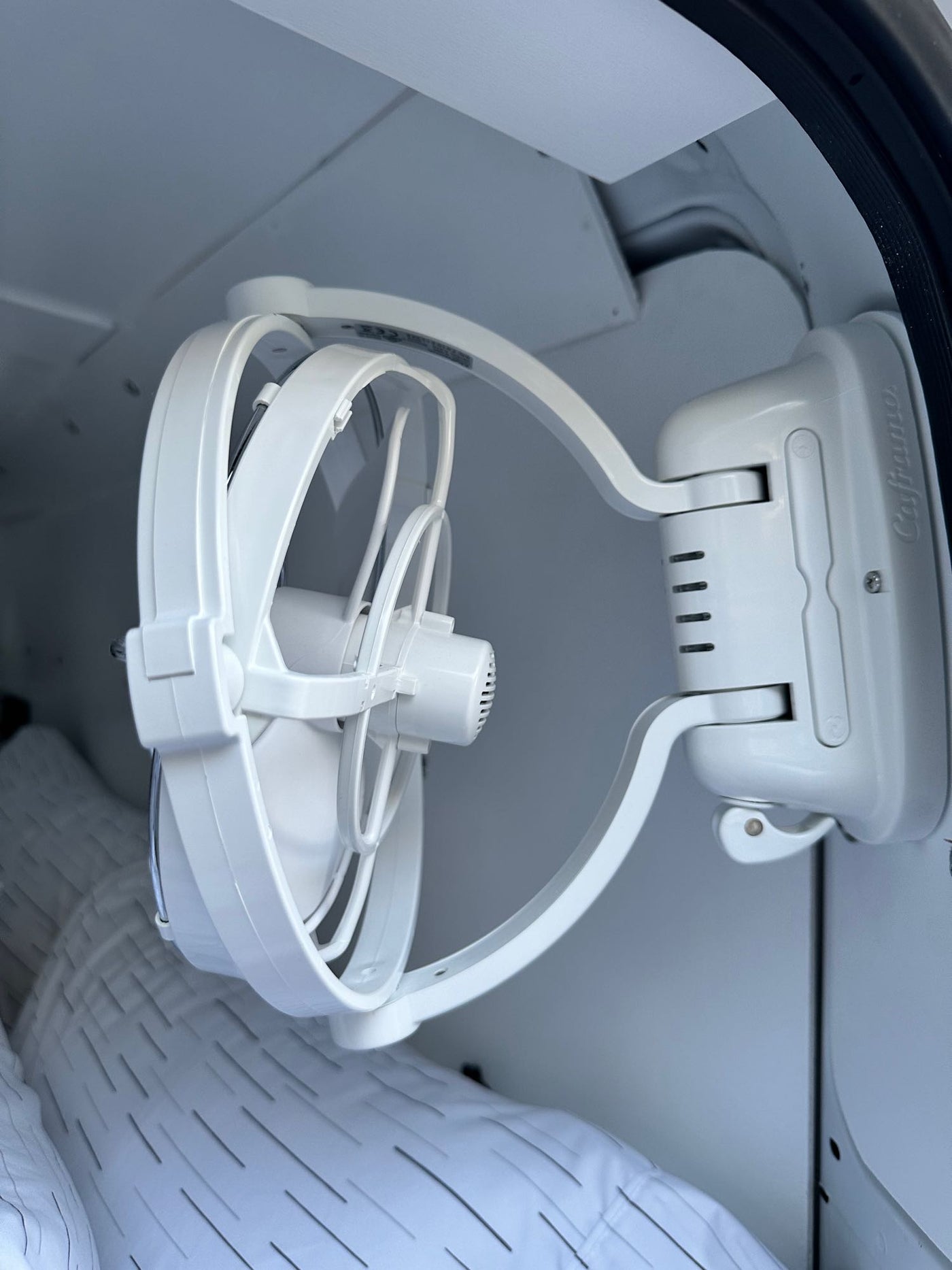  showing compact living amenities for travelers.|Inside an RV rental: a plush camper van bedroom with ambient lighting — photo 20