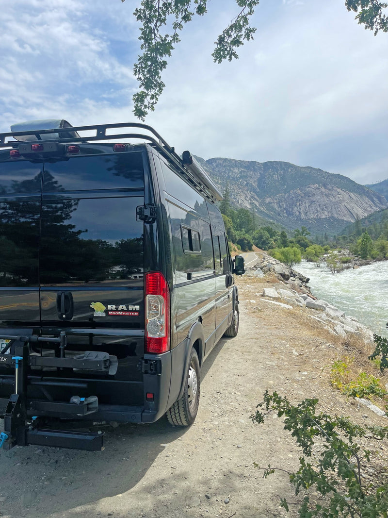  perfect for outdoor travel.|Woman working on a laptop inside an rv rental — photo 13