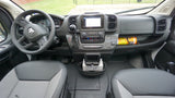 Modern RV rental van interior: driver's view of the detailed dashboard, infotainment screen, and practical cabin layout.