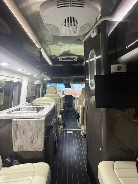  and light-colored seat.|Detailed RV rental interior floor plan from above