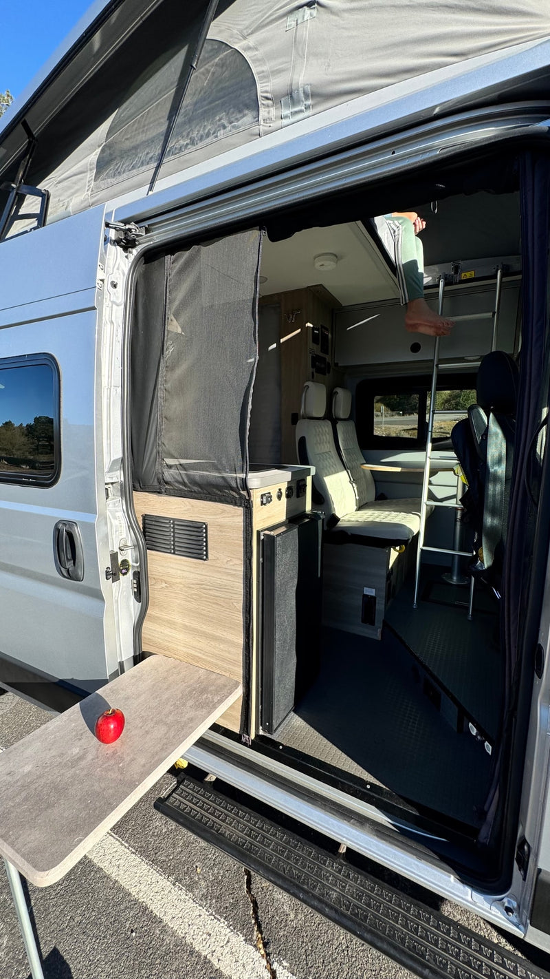  illuminated by sunlight through screened windows.|Detailed 59PX RV rental floor plan with convertible bed — photo 16