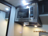  and window blinds offer comfortable travel.|RV rental interior shows a TV screen initializing a BDP-S1700 Blu-ray player