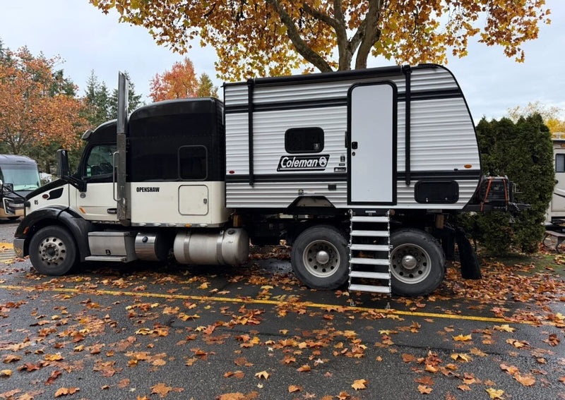 This unique black & white truck-based RV — photo 1