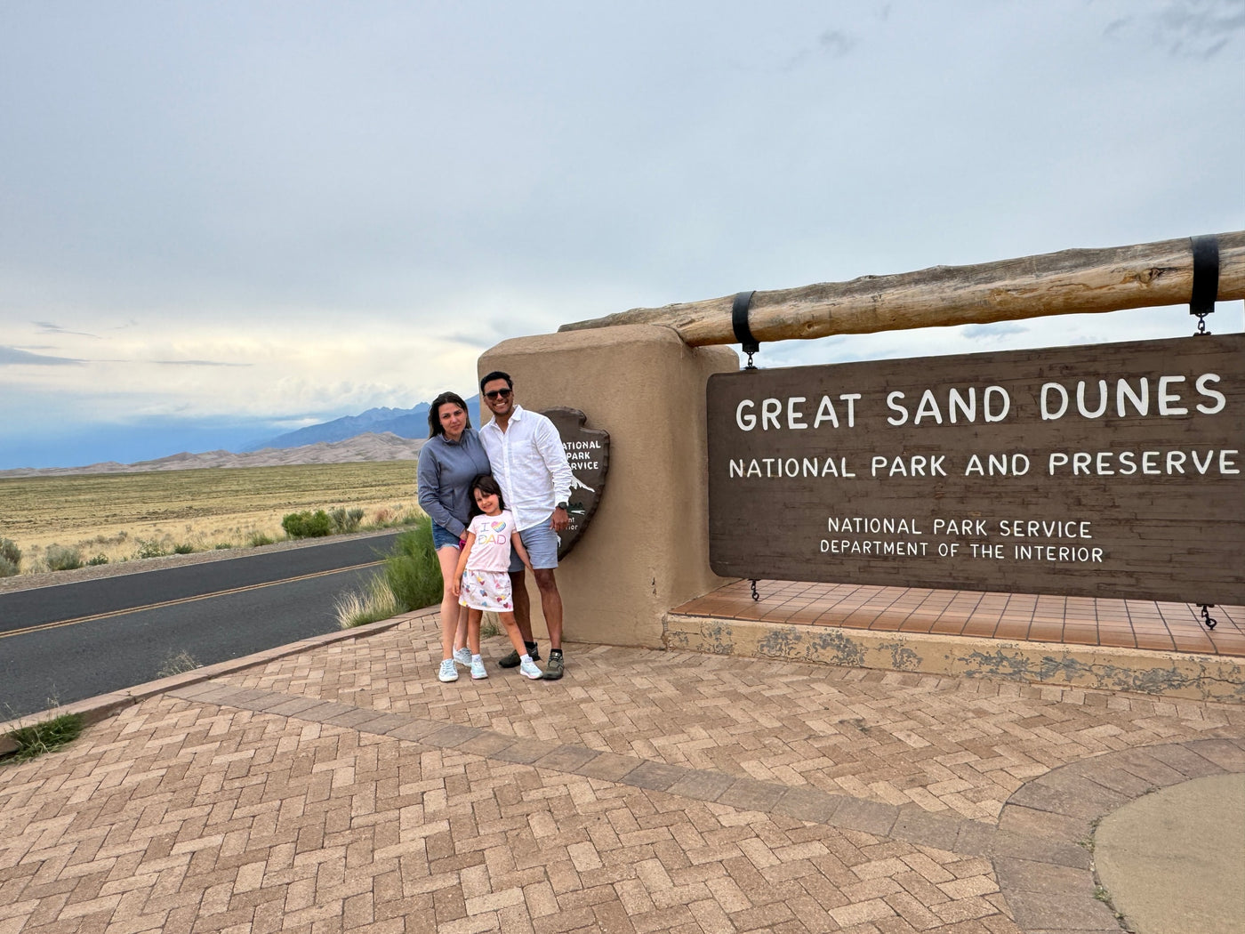 Family at the Great Sand Dunes National Park entrance, a perfect stop for an RV rental adventure and family travel memories. — photo 14