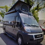 This dark grey Ram ProMaster pop-top camper van is ready for your next RV rental adventure.