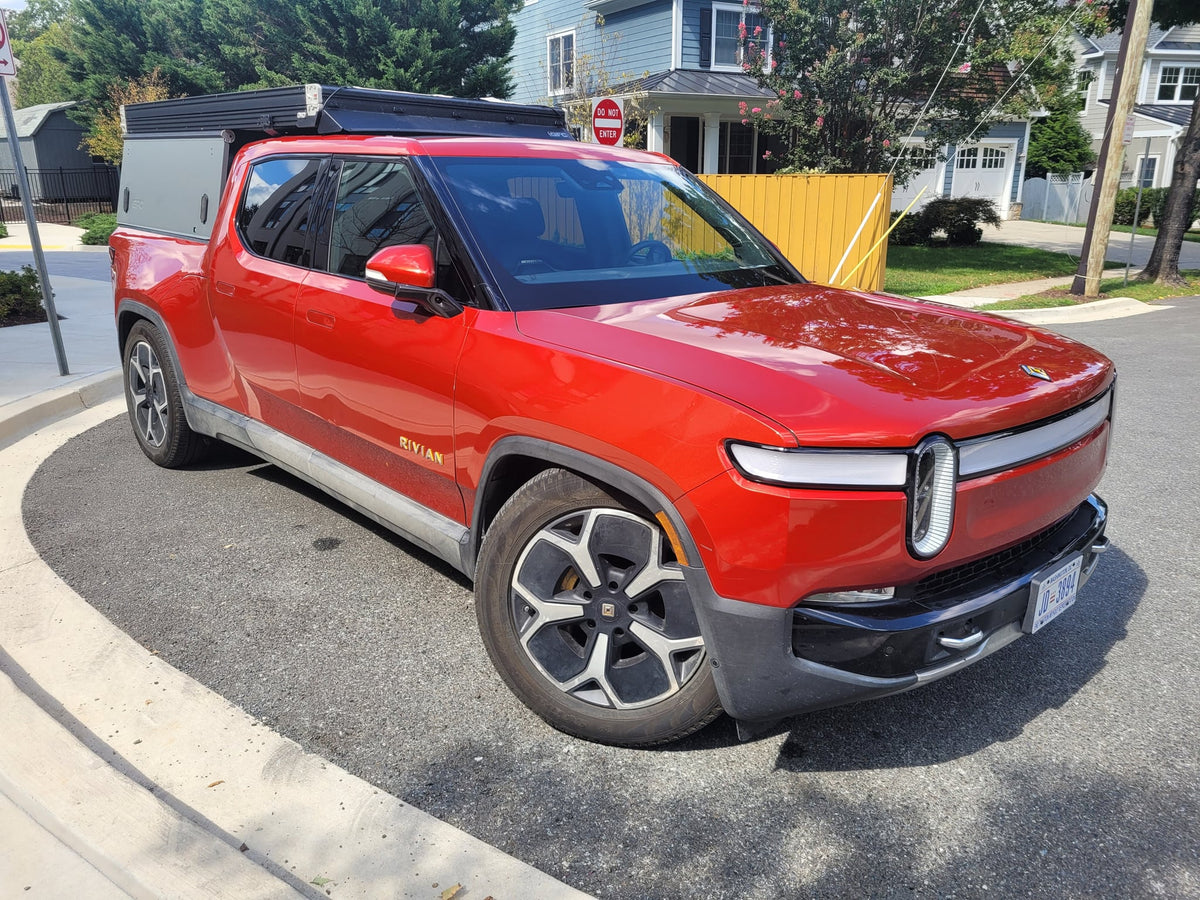  ready for rv rental adventures.|Red Rivian R1T electric truck with a Go Fast Campers shell — photo 10