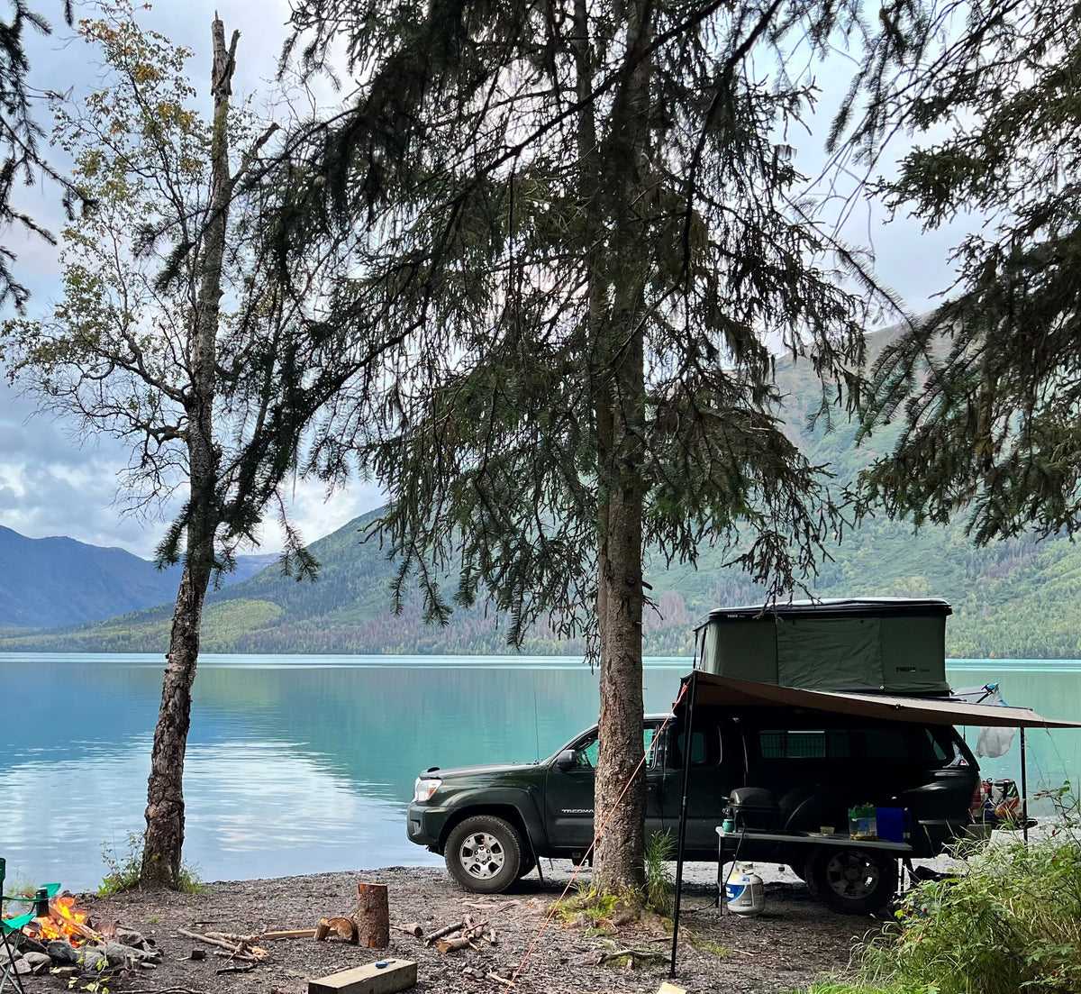 Lakeside camping with a truck, rooftop tent & awning. Ideal for outdoors, a unique RV rental alternative for adventure! — photo 4