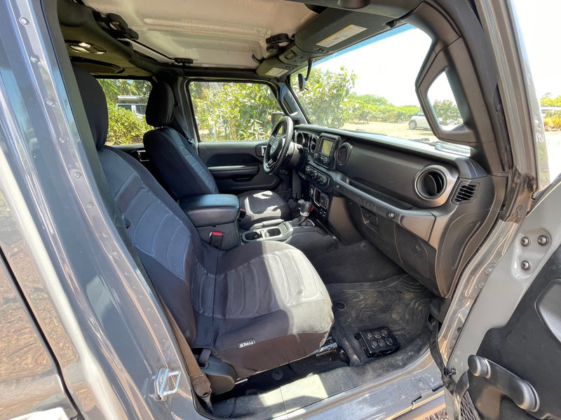 Step inside this adventure-ready Jeep, featuring comfortable seats and a clear dashboard, ideal for your next **rv rental** trip. — photo 7