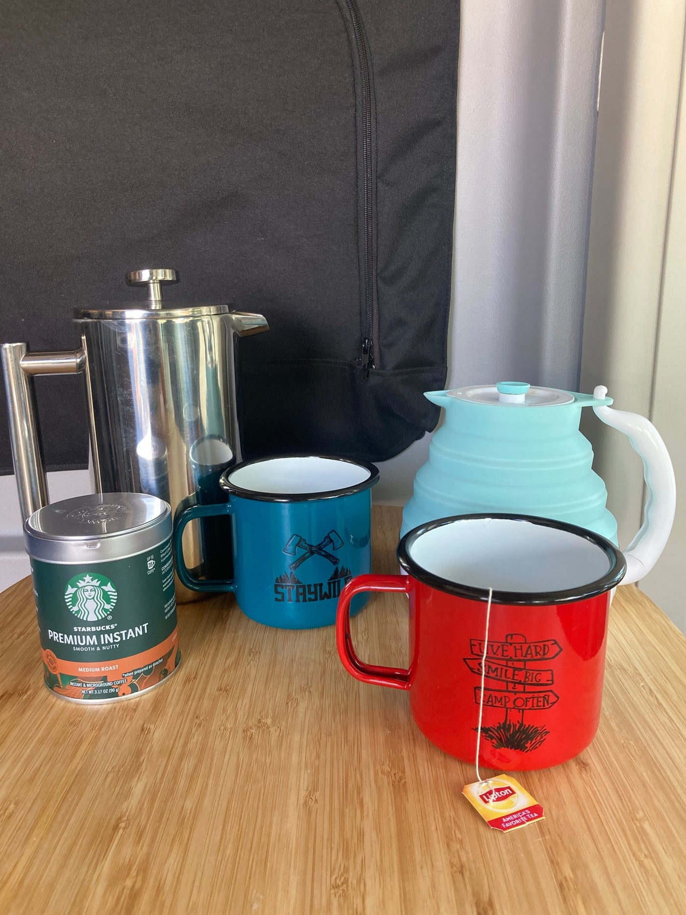 Compact coffee & tea gear for an RV rental: French press, collapsible kettle, mugs, Starbucks coffee, Lipton tea. — photo 17