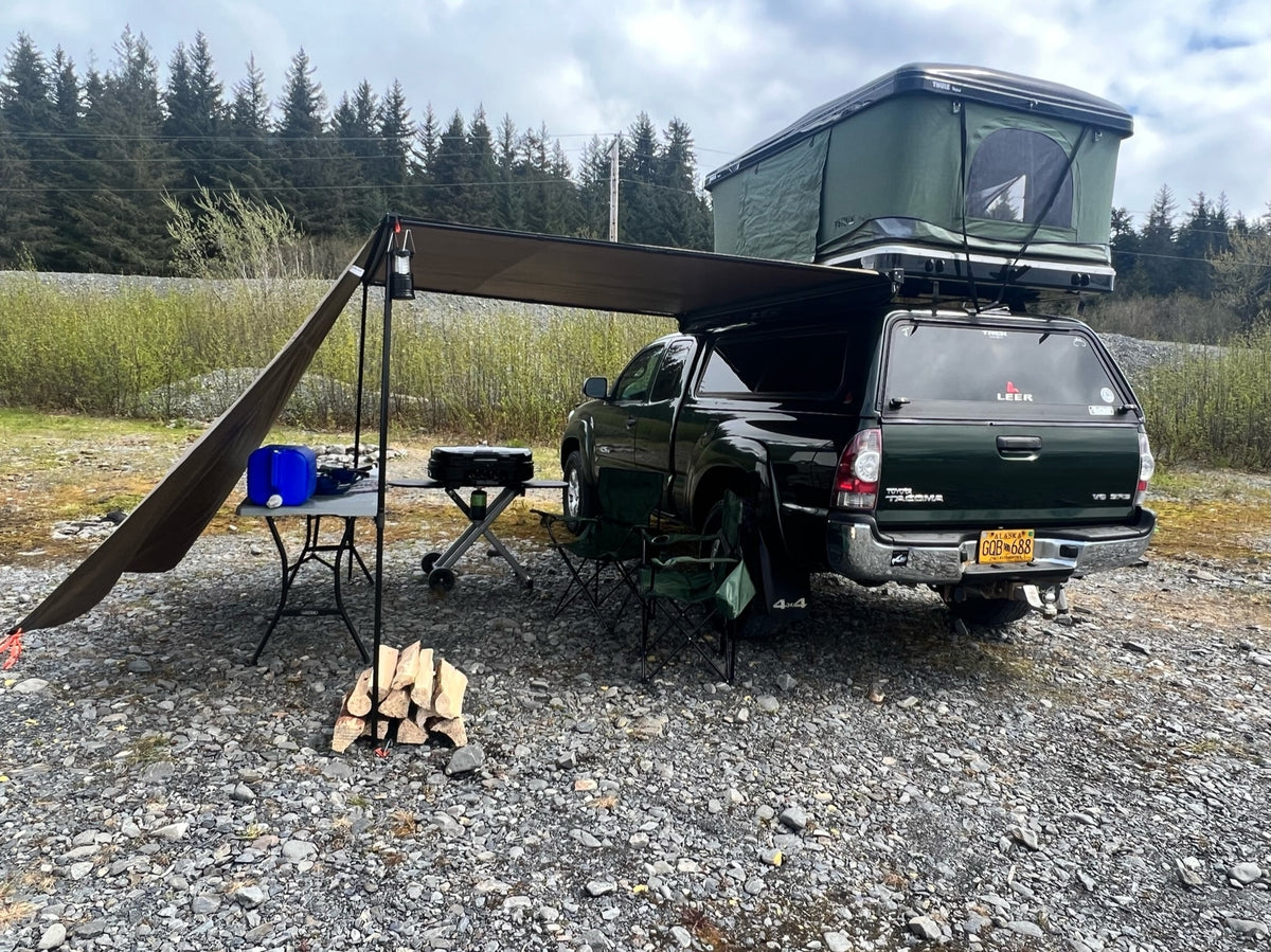 Overland Tacoma truck with rooftop tent & camp setup. An ideal rv rental option for your next outdoor adventure. — photo 2