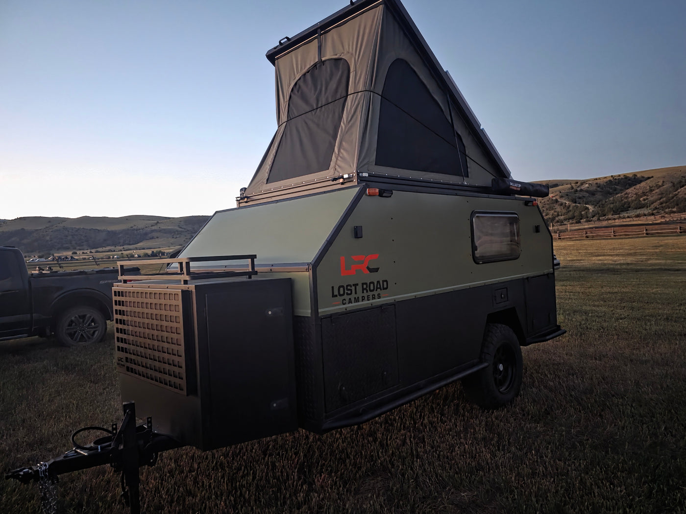 Experience off-grid adventures! This Lost Road Campers pop-top RV rental trailer is ready for rugged trails & scenic views. — photo 7