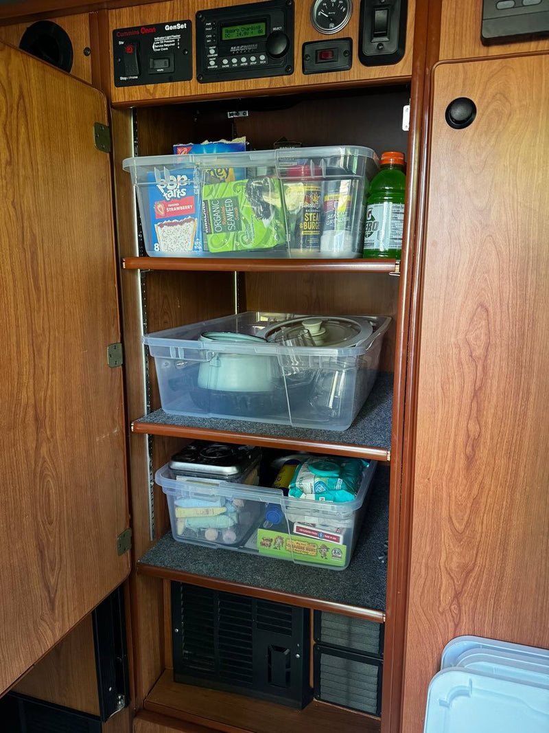 demonstrating ample headroom when extended.|RV rental interior: wood cabinetry with TV — photo 2