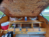 Explore adventure in this unique RV rental! Pirate map ceiling, kitchenette, & mermaid decor in a teardrop camper.