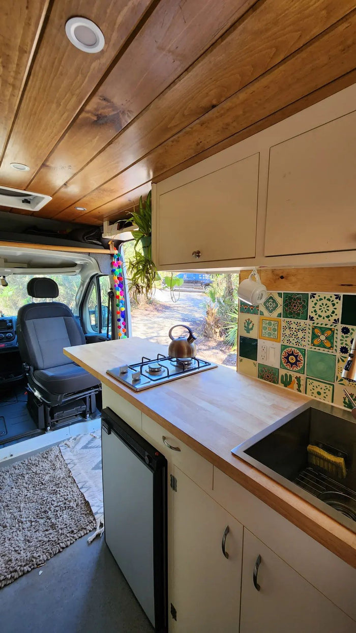  perfect for an RV rental adventure.|Compact RV rental bathroom with white walls
