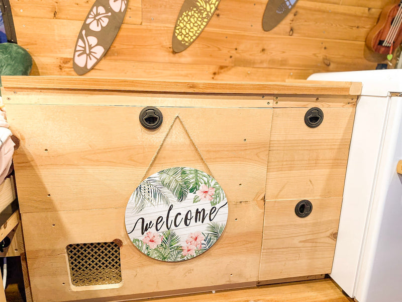  and charming leaf/pineapple string lights.|Experience **van life** in this cozy **RV rental**! A converted van with a comfy bed — photo 16