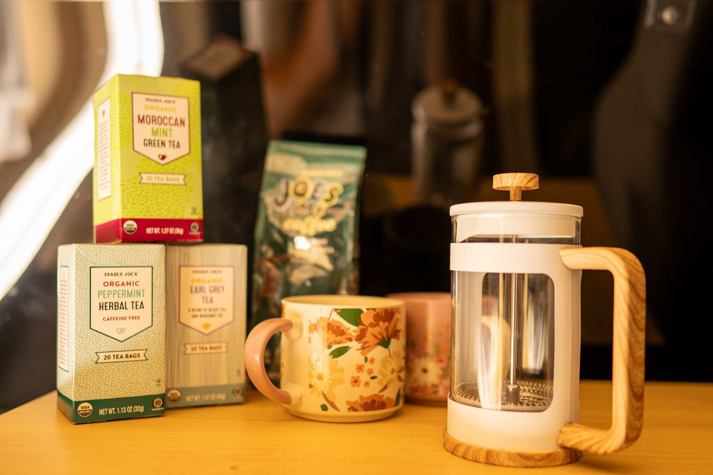 Trader Joe's tea, coffee, and French press for your RV rental. Enjoy comfort brews on the road, perfect for any trip!
