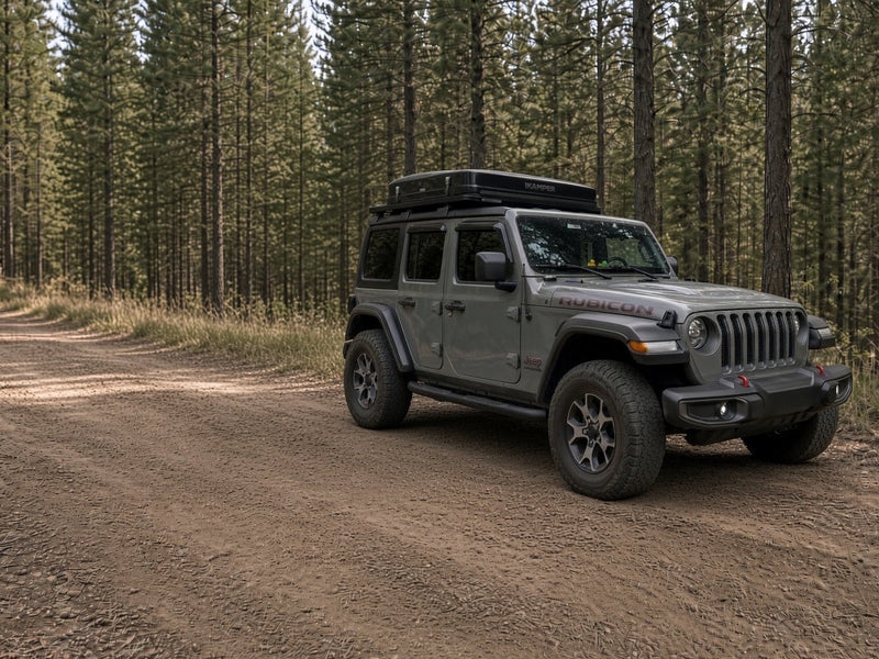  perfect for camping.|A gray Jeep Wrangler with an iKamper rooftop tent — photo 3