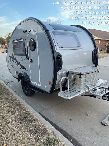 This sleek gray teardrop RV rental is perfect for outdoor adventures & camping trips. Book your travel trailer now!