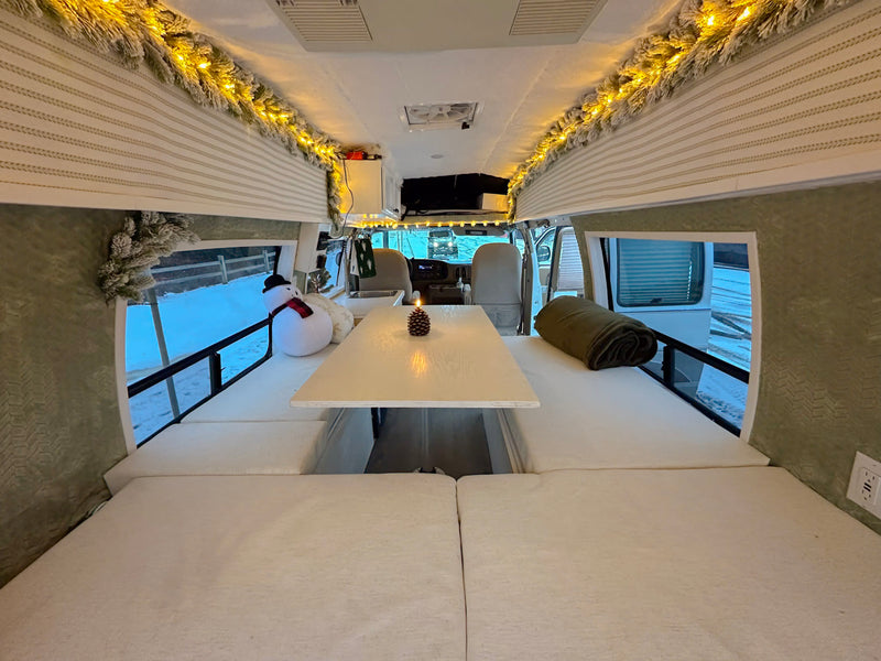 and welcome sign. Ideal for mobile adventures.|A distinctive green high-top van — photo 10