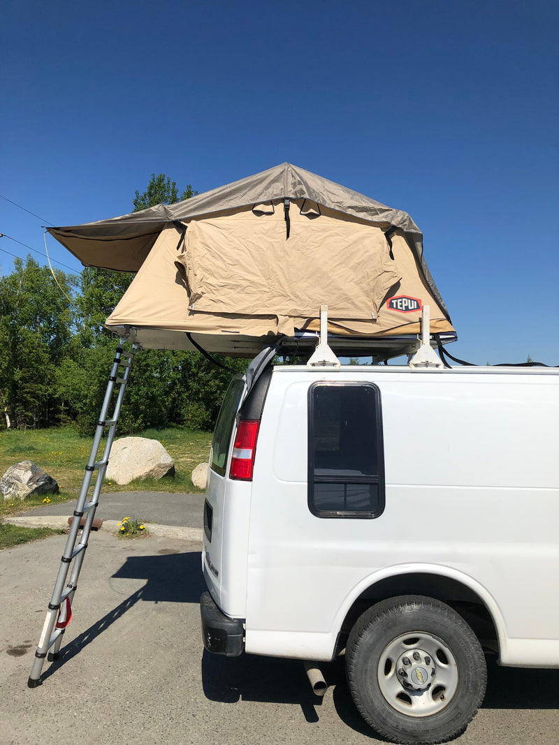 White RV rental van with a beige rooftop tent deployed, ladder extended. Perfect for van life and camping adventures. — photo 5