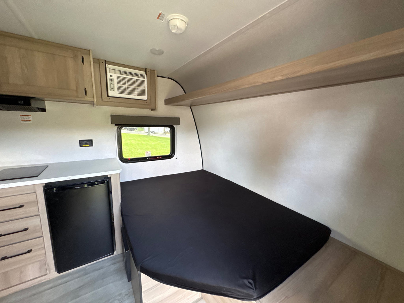  and under-counter fridge.|This modern Coleman travel trailer — photo 4