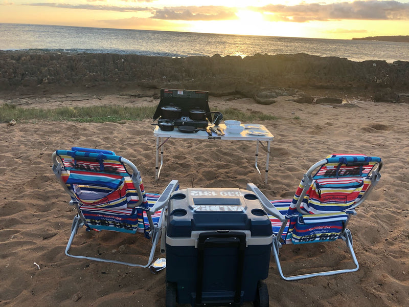  and portable stove with dinnerware on the sand — photo 3