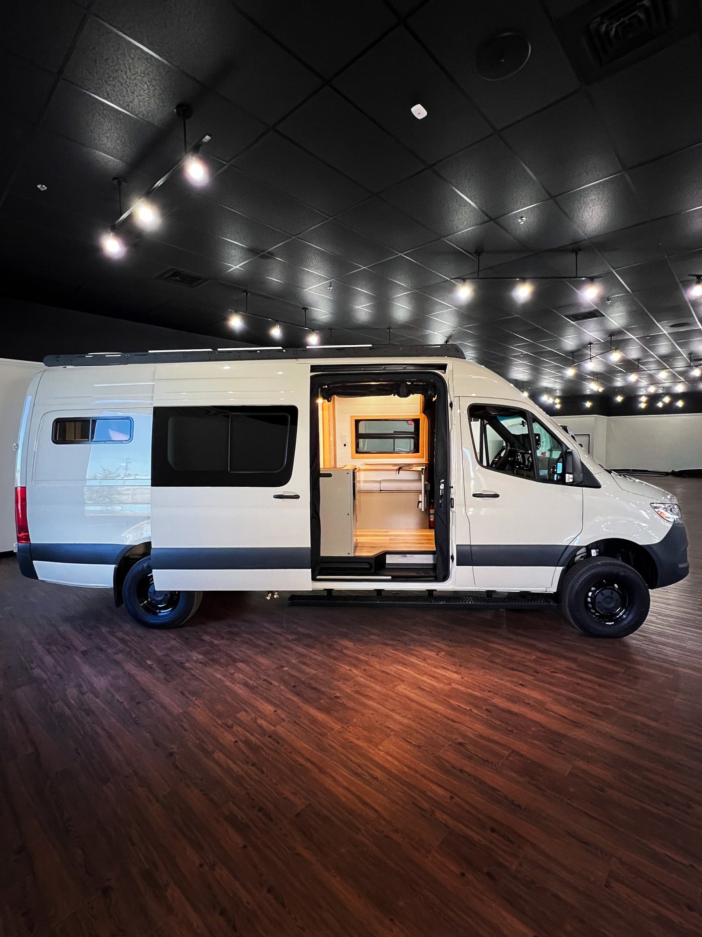  ideal for your RV rental journey.|This modern white camper van — photo 2