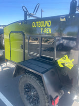 Rugged Outbound T-REX off-road trailer. This compact camper, ideal for RV rental, sports vibrant lime green and black panels.