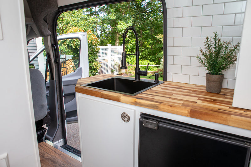 Ultimate Adventure Van with AC & Hot Shower, Battery bank, Queen Bed — photo 9
