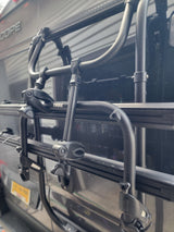A Thule bike rack, designed for an RV rental, securely mounted on the vehicle's rear. Ready for outdoor excursions.