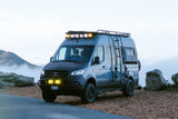 Explore with this robust Mercedes Sprinter RV rental, equipped with bright lights & gear for mountain adventures.