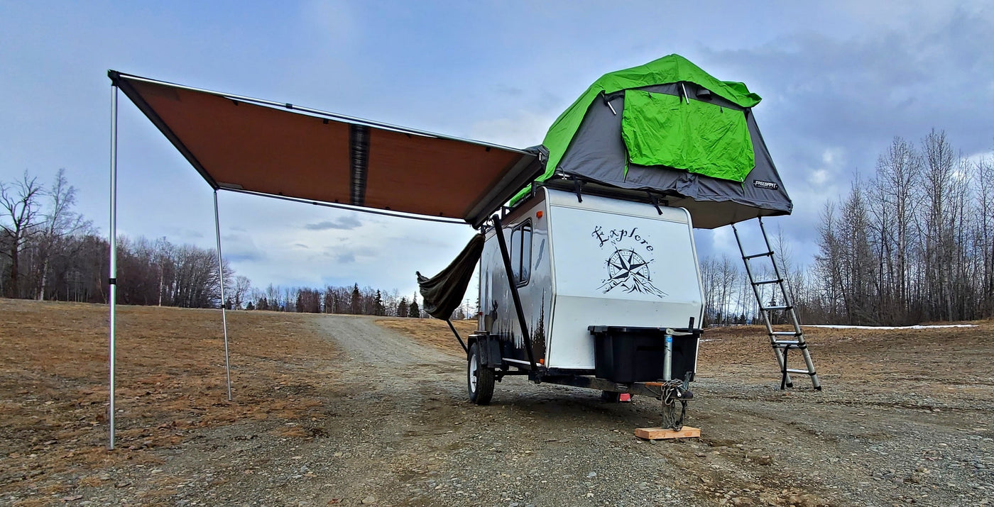 This adventure-ready camper with a rooftop tent & awning is perfect for your next rv rental camping trip! — photo 12