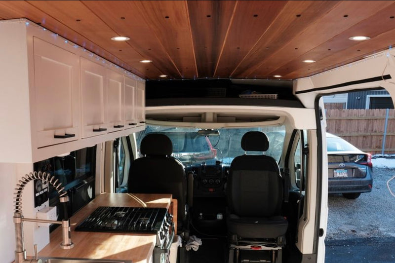 full of fresh and frozen food.|Step inside this cozy RV rental with custom wood ceilings — photo 8