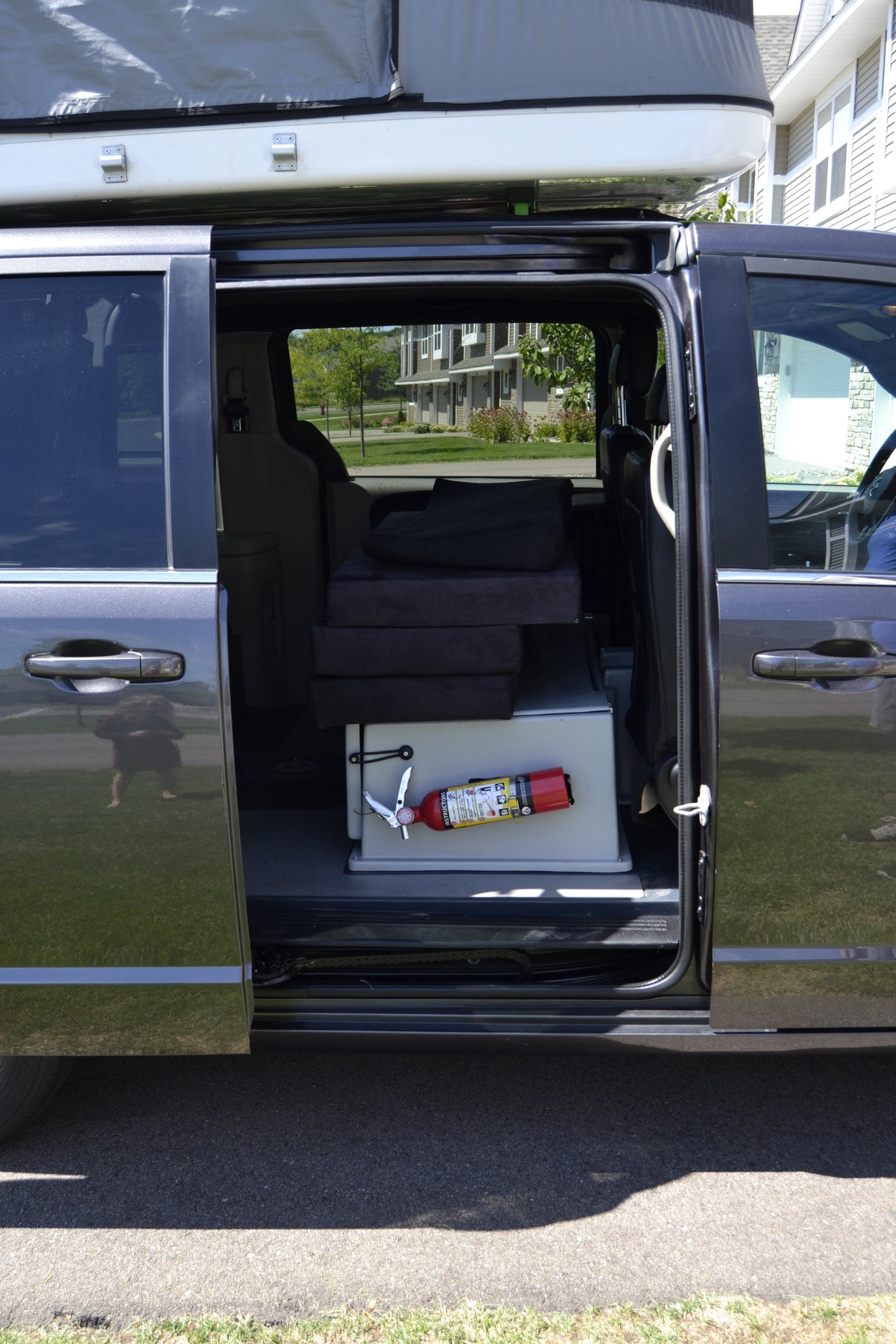  ideal for an rv rental adventure.|RV rental: Minivan camper interior featuring a dining table — photo 14