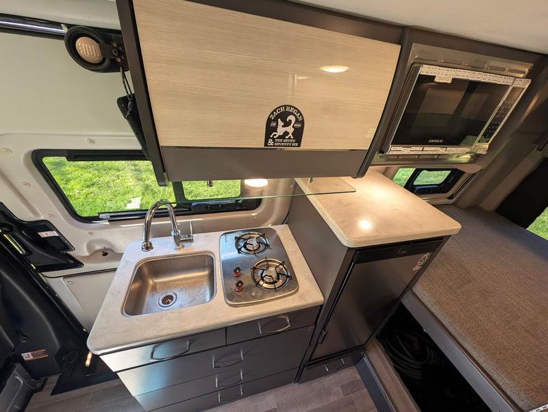  grassy field.|Silver Mercedes Sprinter adventure van — photo 17