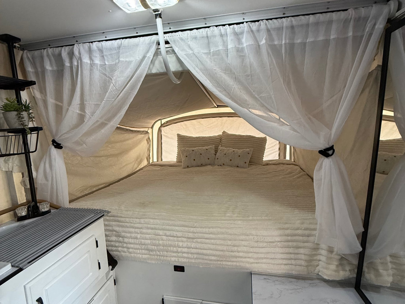  and modern decor.|Modern RV rental interior: grey bench with pillows — photo 6