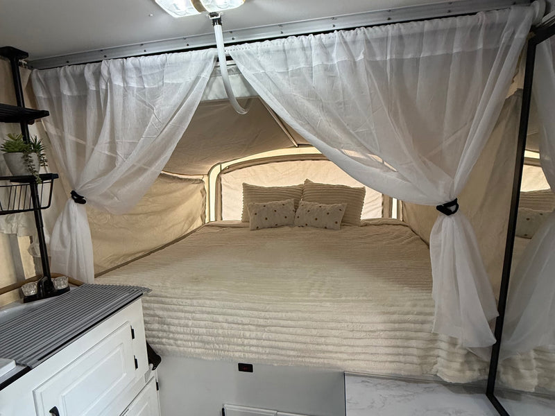  and modern decor.|Modern RV rental interior: grey bench with pillows — photo 6