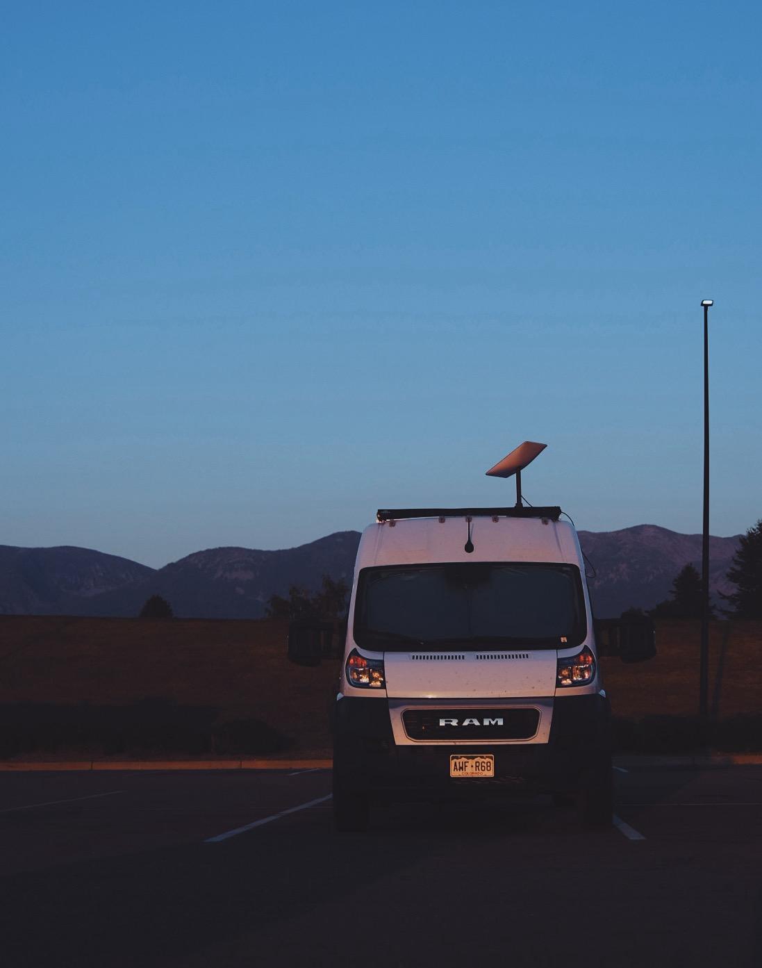 RV rental ready! White Ram camper van, Starlink dish on roof, parked at dawn against mountains. — photo 18