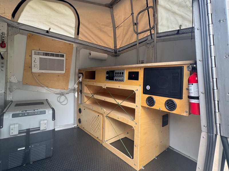  parked at a scenic mountain campsite — photo 3
