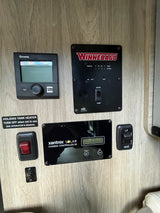RV rental control panel: Truma heater, Winnebago tank/battery levels, Xantrex solar charge controller, and water/LPG switches.