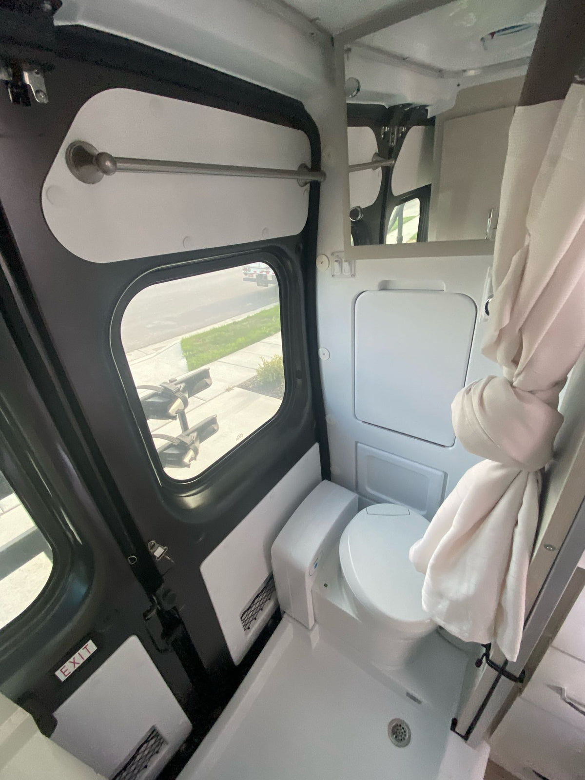  and scenic views for travel.|RV rental interior with a cozy mobile office setup: laptop — photo 12