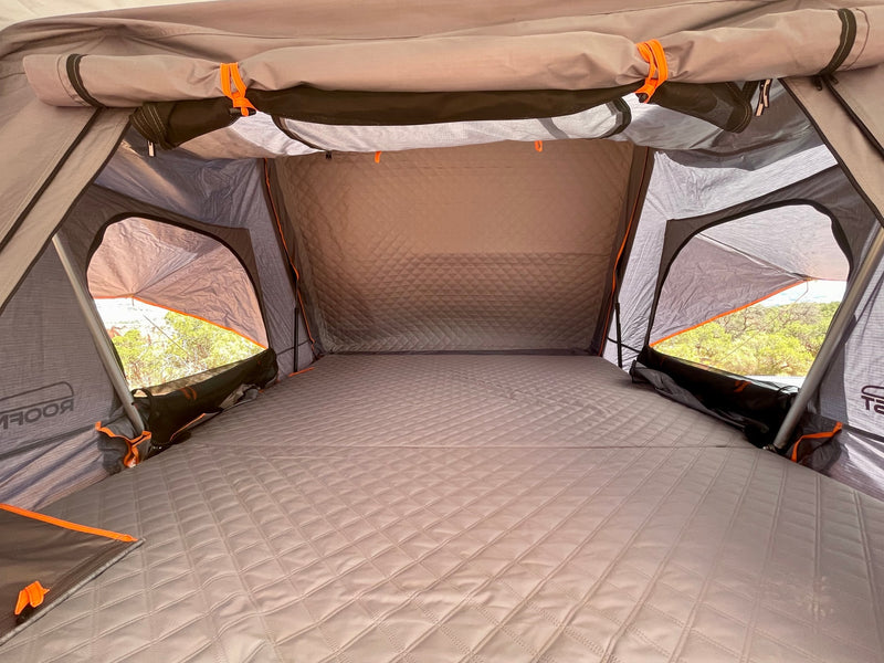  arid landscape.|White Jeep Gladiator overland vehicle with rooftop tent in red rock canyons. Perfect for your adventurous RV rental trip!|This white Jeep Gladiator **RV rental** with a rooftop tent overlooks a scenic valley from a desert cliff — photo 11